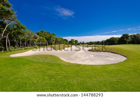 Sand bunker on the golf course. Mexican resort. Bahia Principe, Riviera Maya.
