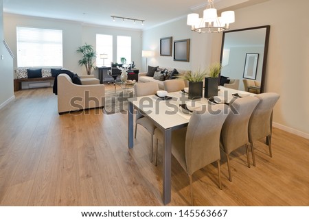 Luxury Living Suite : Dining Room With The Coffee Set On The Table And The Living, Family Room At The Back. Interior Design.