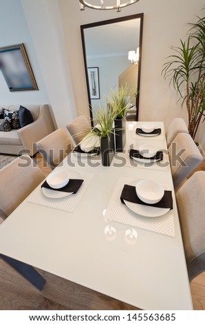Nicely decorated and served living ( lunch ) room table with the coffee set. Intrerior design. Vertical.