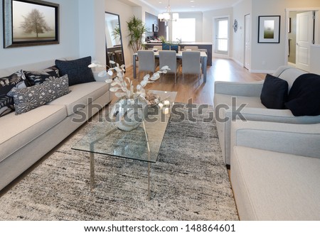 Decorative Vase On The Coffee Table In The Living Room With The Dinner, Lunch Table At The Back. Interior Design.