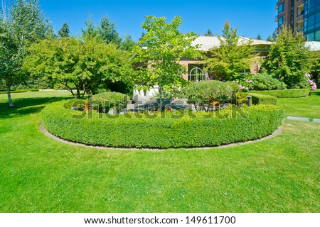Landscape design. Nicely trimmed bushes in the park. Vancouver. Canada.