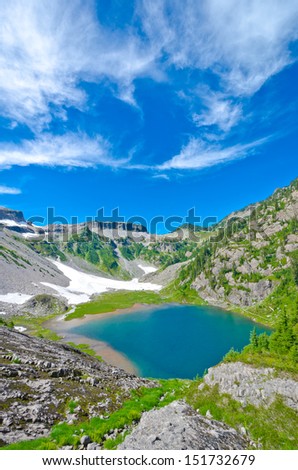 Table mountain at Mount Baker lands and wilderness with Bagley lake at the base.  North America. Vertical.