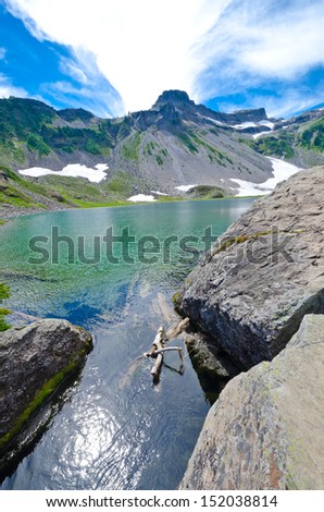 Gorgeous view at the Bagley lake at the Table mountain in Mount Baker lands. North America. Vertical.