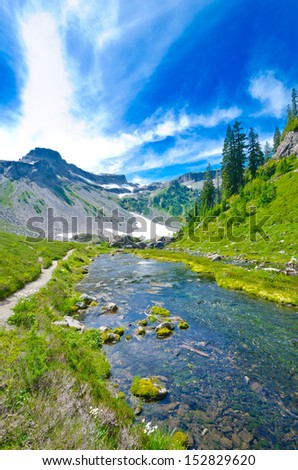 Gorgeous view at the valley with creek of Bagley lakes system in Mount Baker lands. North America.