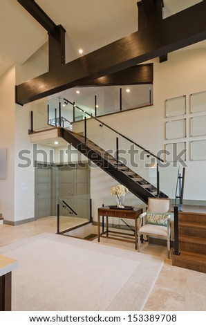 Fragment Of The Luxury Spacious Modern Room With The Stairs To The Upper Level. Interior Design. Vertical.