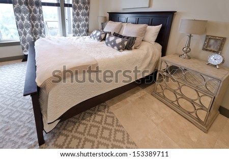 Modern, stylish, comfortable and elegant luxury master bedroom. Interior design.