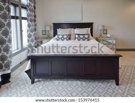 Modern, stylish, comfortable and elegant luxury master bedroom. Interior design.
