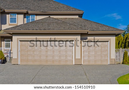 Double doors and one door garage. North America.