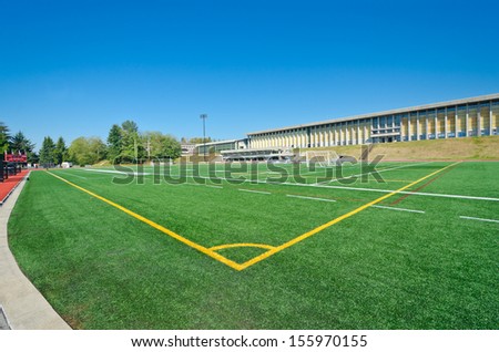 Corner marks of a soccer, football field in a bright sunny day.