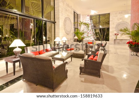 Fragment of the lobby of the five stars luxury caribbean resort hotel Reception area Interior design Bahia Principe Riviera Maya Mexican Resort Fragment of the lobby of the five stars luxury caribbean resort hotel Reception area Interior design Bahia Principe Riviera Maya Mexican Resort