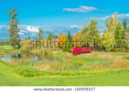 Great view (panorama, outlook ) at the beautiful golf course  in autumn, fall time in the suburbs of Vancouver, Canada. Vertical.