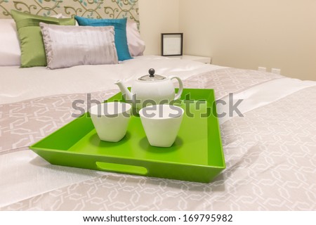 Decorative Tray With The Coffee Set On The Bed In The Luxury Master Bedroom. Interior Design.