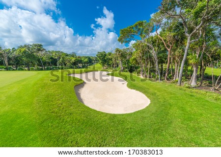 Sand bunker on the golf course of the luxury Mexican resort. Bahia Principe, Riviera Maya.