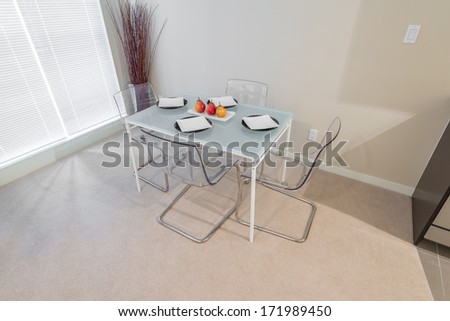 Luxury Living Suite. Nicely Decorated And Served Modern Dining Room With The Table With Some Plates. Interior Design.