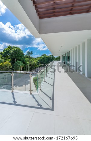 Perspective of the modern glass and steel balcony, deck, patio railing. Exterior, interior design.