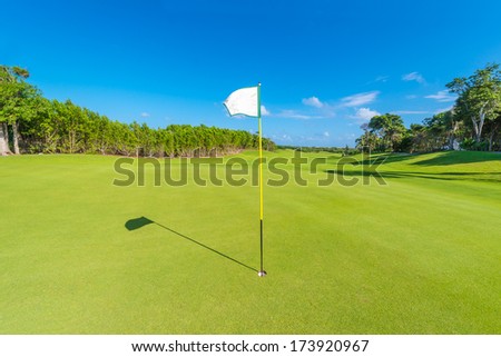Flag at the golf course. Luxury mexican resort. Bahia Principe, Riviera Maya.