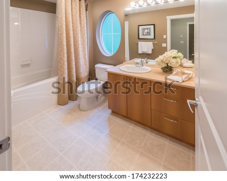 Nicely decorated washroom, bathroom with the toilet. Interior design.