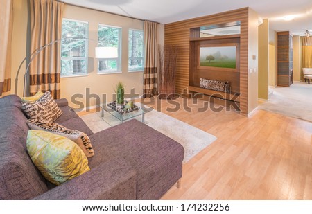 Outlook, panorama at the luxury living room with sofa, couch and coffee table. Interior design.
