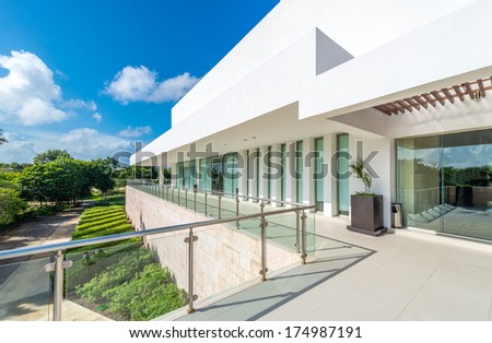 Perspective, panorama at the modern glass and steel balcony, deck, promenade with glass and steel railing. Exterior, interior design.