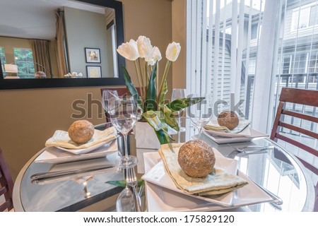 Nicely decorated and served living ( lunch ) room table. Interior design.
