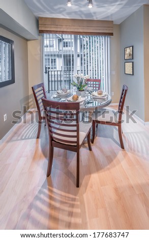 Nicely decorated and served living ( lunch ) room table. Interior design. Vertical.