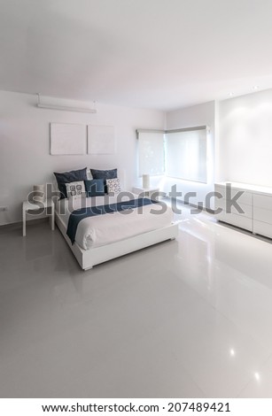 Modern comfortable and elegant luxury master bedroom. Interior design. Vertical.