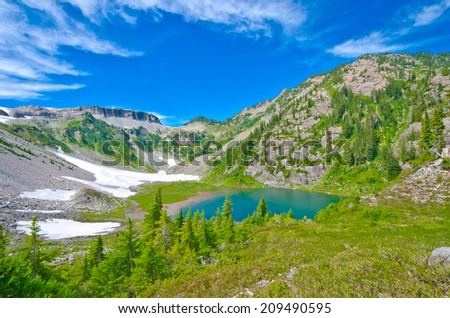 Gorgeous view at the valley with lakes and snow at mountain lands and wilderness. North America.