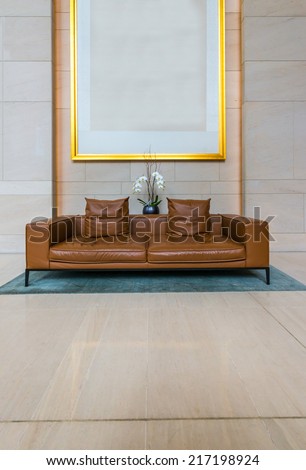 Lounge area of a hotel, club, company lobby. Fragment of the modern lobby of the  hotel.  Interior design. Vertical.