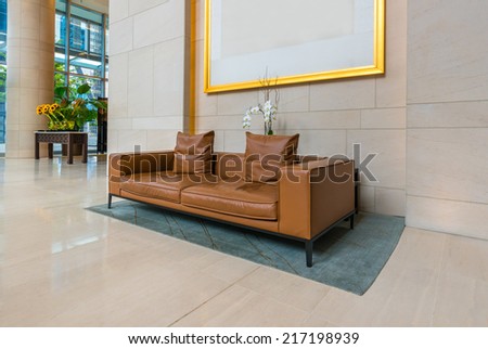 Lounge area of a hotel, club, company lobby. Fragment of the modern lobby of the  hotel.  Interior design.