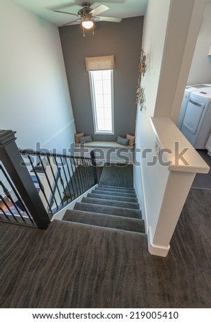 Stairs to the upper, lower house level. Interior design. Vertical.