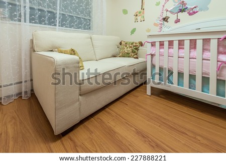 Modern comfortable, nicely decorated children, baby bedroom. Interior design.