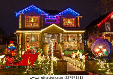 Big luxury house decorated and lighted for Christmas and for New Year Eve at Night at Vancouver, Canada.