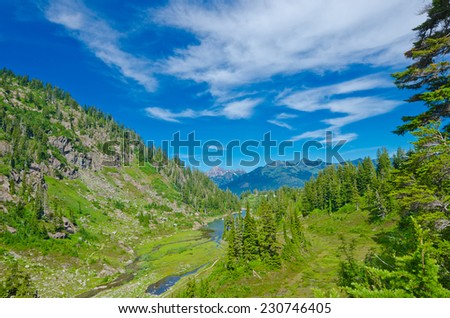 Gorgeous view at the valley with lakes and snow at mountain lands and wilderness. North America.