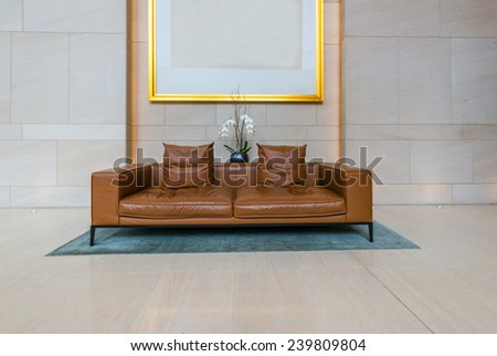 Lounge area of a hotel, club, company lobby. Fragment of the modern lobby of the  hotel.  Interior design.