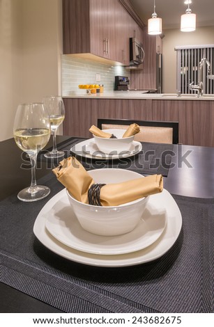 Napkins on the nicely decorated and served dining table. Interior design of a brand new house. Interior design.