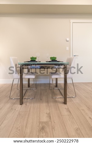 Nicely decorated and served living, lunch, dining room table. Interior design. Vertical.