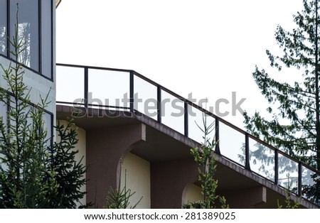 Perspective, silhouette of the modern glass and steel balcony, deck railing.