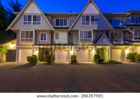 Townhouses, homes community at  dusk, night in suburbs of Vancouver, Canada