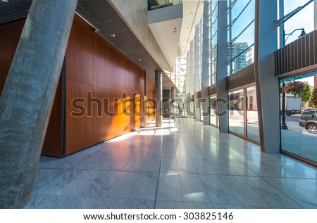 Abstract fragment of the urban architecture of modern luxury building, center, hotel, shopping mall, business centre. Interior design. Vertical.