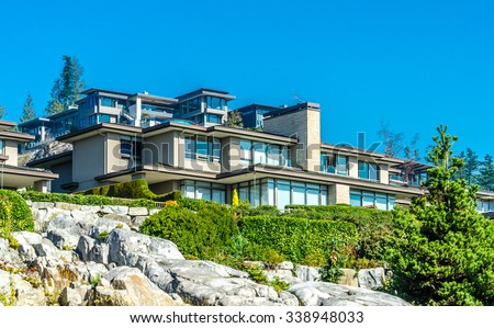 Custom built luxury modern house on the cliff, rock  in a residential neighborhood. Vancouver Canada.