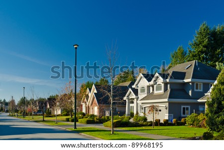 Great neighborhood. A homes  in suburbs at fall time in the north America