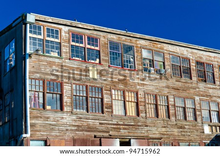 stock-photo-old-times-wooden-warehouse-industrial-building-in-vancouver-canada-94715962.jpg