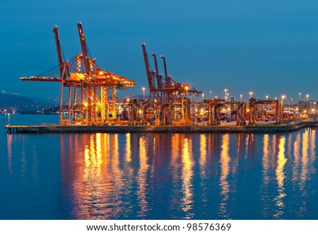 Container port terminal at disk (dawn, night ) in Vancouver,  BC