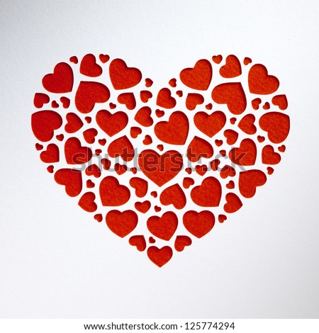 Valentine day heart made of small hearts on paper card Valentine day heart made of small hearts on paper card