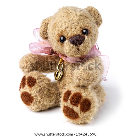 Teddy bear in classic vintage style isolated on white background