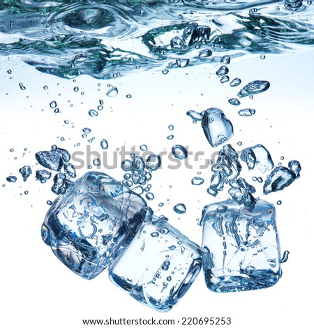 Three ice cubes on white background poured in water