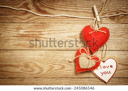 Valentine\'s Day card made in eco loving concept on a vintage wooden background.