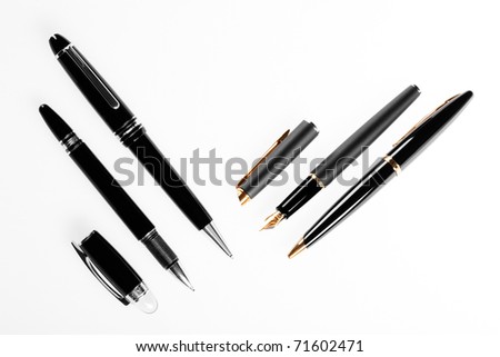 writing tools , cost pens isolated on white