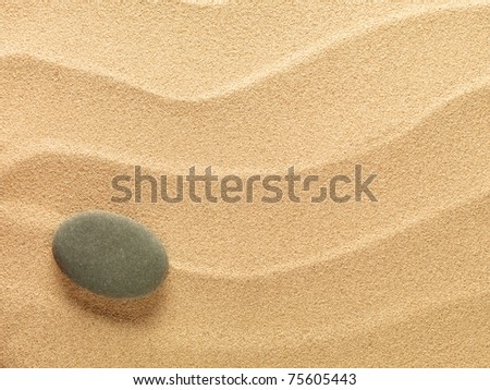 beach sand background with stone