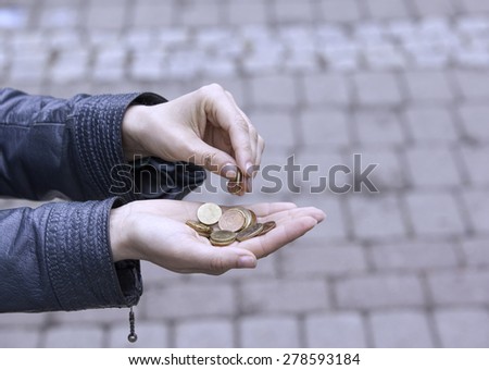 Euro small change in the hands of women.